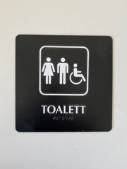 Taktilt piktogramskilt Toalett